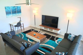 Modern Oasis! Walk to Beach, King Bed, Backyard & Workspace
